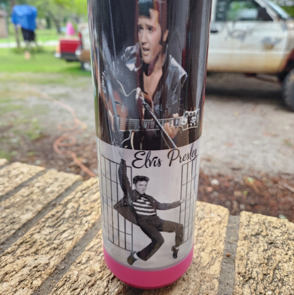 Elvis Presley tumbler cup with pink blue tooth speaker.